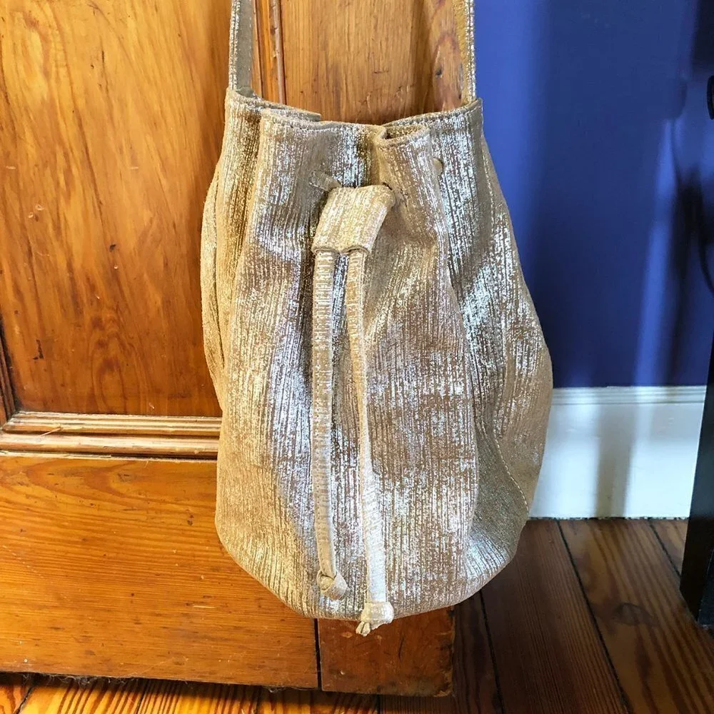Marie Turnor Neutral Metallic Textured Drawstring Bucket Bag